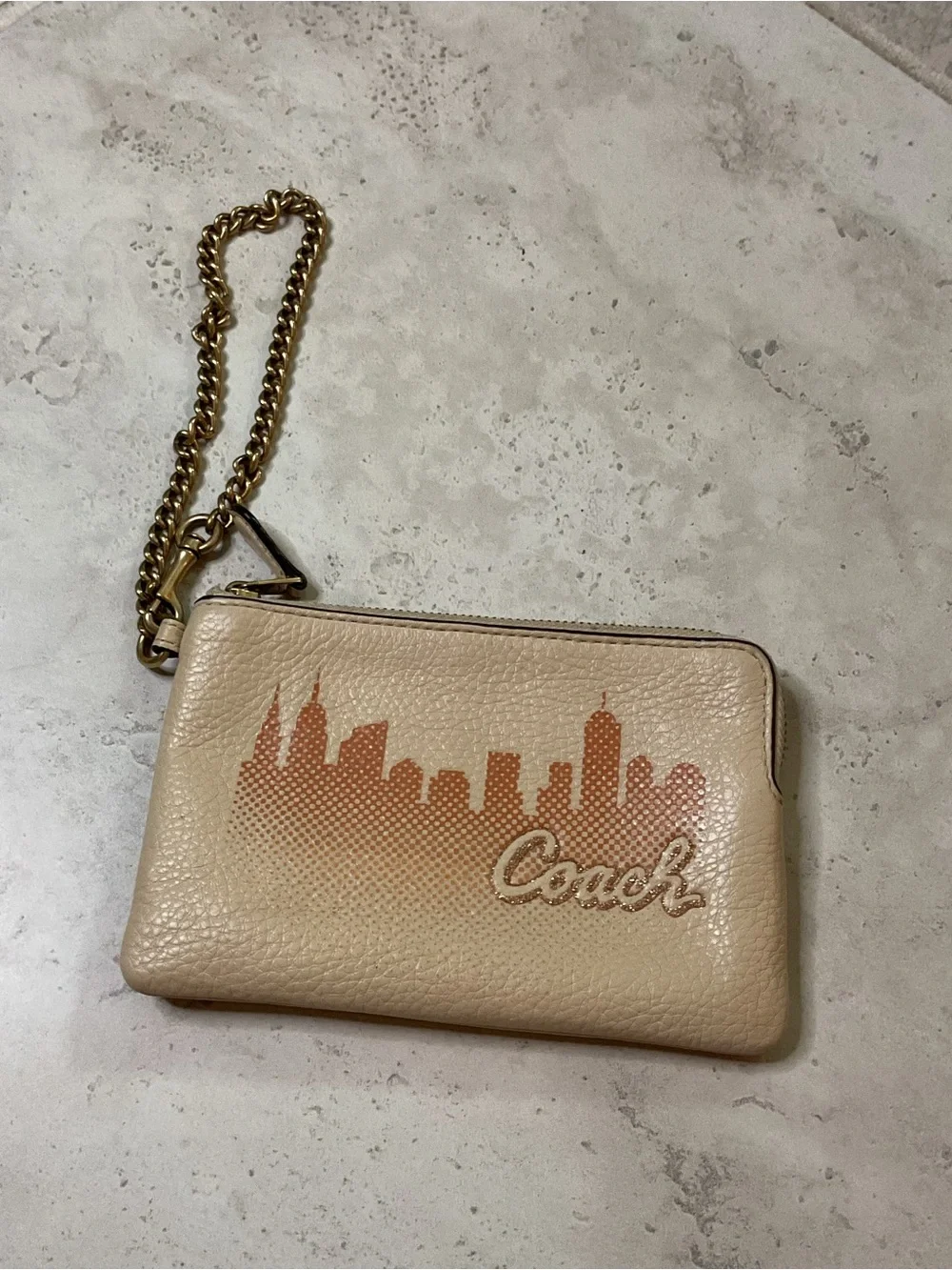 Coach X Jennifer Lopez corner cream Pebbled Leather Wristlet, City Skyline EUC